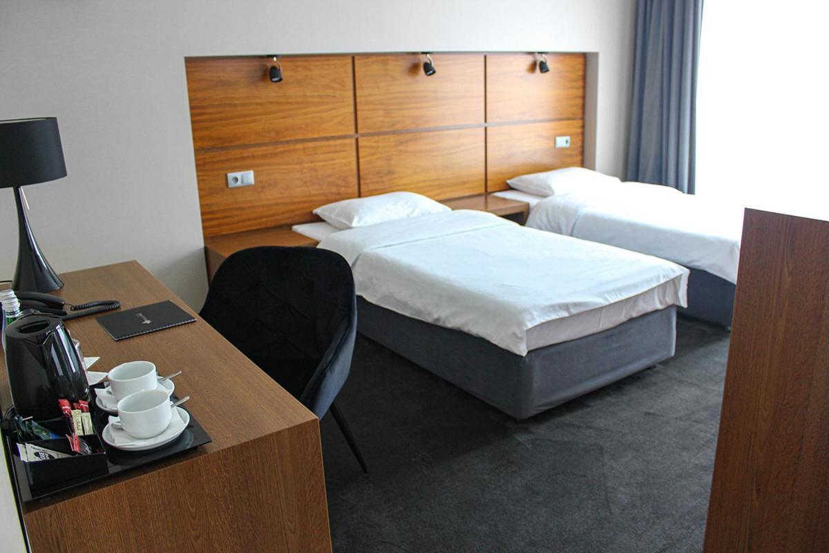 Willa Port Ostroda Luaran gambar A room at the hotel